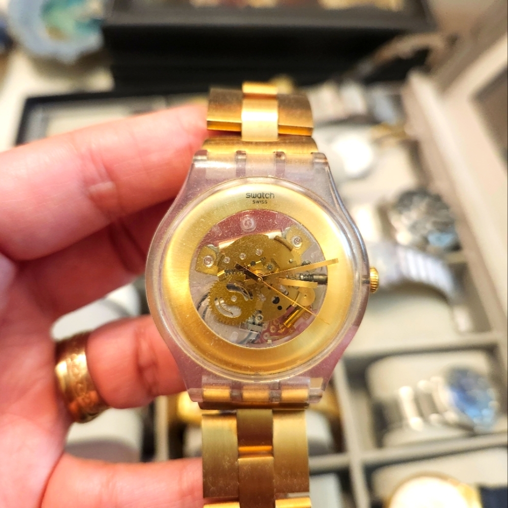 Swatch gold watch